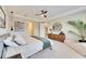 Bright bedroom featuring a comfy bed and modern dresser at 5612 Limelight Dr, Apollo Beach, FL 33572