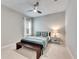 Well-lit bedroom with a queen bed and a nightstand at 5612 Limelight Dr, Apollo Beach, FL 33572