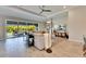Open concept living room and kitchen area with tile floors at 5612 Limelight Dr, Apollo Beach, FL 33572