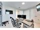 Home office with dual monitors and large desk at 5612 Limelight Dr, Apollo Beach, FL 33572