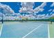 Well-maintained tennis courts with shade structures at 5612 Limelight Dr, Apollo Beach, FL 33572