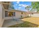 Backyard patio with seating and a grassy area at 6890 Dr Martin Luther King Jr S St, St Petersburg, FL 33705