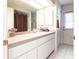 Bathroom with vanity, shower, and exterior access at 72 Norman St, Port Charlotte, FL 33954