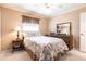 Bedroom with double bed, dresser, and ceiling fan at 72 Norman St, Port Charlotte, FL 33954