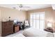 Bedroom with two twin beds, dresser, and shutters at 72 Norman St, Port Charlotte, FL 33954