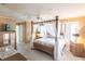 Main bedroom with a large canopy bed and ample space at 72 Norman St, Port Charlotte, FL 33954