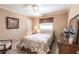 Bedroom with double bed, dresser, and ceiling fan at 72 Norman St, Port Charlotte, FL 33954