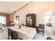 Formal dining room with a lovely table setting and built-in hutch at 72 Norman St, Port Charlotte, FL 33954