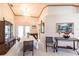 Well-lit dining room featuring a formal table setting and view to kitchen at 72 Norman St, Port Charlotte, FL 33954