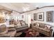 Open living room featuring hardwood floors and ample natural light at 72 Norman St, Port Charlotte, FL 33954
