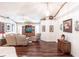 Bright living room featuring hardwood floors and a built-in entertainment center at 72 Norman St, Port Charlotte, FL 33954