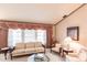 Living room with light walls, large windows, and comfortable furniture at 72 Norman St, Port Charlotte, FL 33954