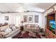 Spacious living room featuring hardwood floors and ample natural light at 72 Norman St, Port Charlotte, FL 33954