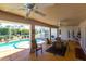 Relaxing screened-in pool area with patio furniture at 72 Norman St, Port Charlotte, FL 33954