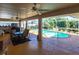 Covered patio overlooking the refreshing pool at 72 Norman St, Port Charlotte, FL 33954