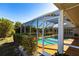 Screened-in pool with easy access from the patio at 72 Norman St, Port Charlotte, FL 33954