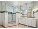 Spa-like bathroom with a large shower and double vanity at 728 Wood St, Dunedin, FL 34698