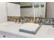 White double vanity with a marble countertop and decorative tray at 728 Wood St, Dunedin, FL 34698