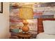 Rustic-chic bedroom detail; bedside table and lamp at 728 Wood St, Dunedin, FL 34698