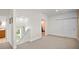 Upstairs hallway with access to bedrooms and bathroom at 728 Wood St, Dunedin, FL 34698
