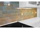 Close up of kitchen backsplash with unique tile work at 728 Wood St, Dunedin, FL 34698