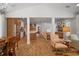 Bright and airy living room features hardwood floors and open concept design at 728 Wood St, Dunedin, FL 34698