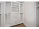 Spacious walk-in closet with ample shelving and drawer space at 728 Wood St, Dunedin, FL 34698