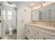 Charming bathroom with double vanity and a separate toilet area at 735 Bonnie Blvd, Palm Harbor, FL 34684