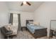 Cozy bedroom with a full-size bed and a window at 735 Bonnie Blvd, Palm Harbor, FL 34684