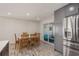 Kitchen dining area with view of the patio at 735 Bonnie Blvd, Palm Harbor, FL 34684