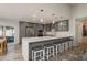 Modern kitchen featuring stainless steel appliances and a large island at 735 Bonnie Blvd, Palm Harbor, FL 34684