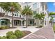 Modern storefront with palm trees at 845 Maple Ct # 107, Dunedin, FL 34698