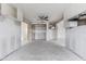 Ample kitchen space featuring white cabinets, ready for renovation at 8703 Driftwood Dr, Tampa, FL 33615