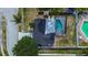 Aerial view of a house with a pool and fenced backyard at 9750 68Th N St, Pinellas Park, FL 33782