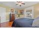 Charming bedroom with hardwood floors, and vintage dresser at 1001 13Th N St, St Petersburg, FL 33705