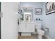 Clean bathroom, white vanity, and light blue walls at 1120 E Kennedy Blvd # 1514, Tampa, FL 33602