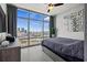 Bedroom with city view and wood-look floors at 1120 E Kennedy Blvd # 1514, Tampa, FL 33602