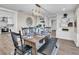 Bright dining area features a wooden table and built-in shelving at 11416 Pine Forest Dr, New Port Richey, FL 34654