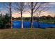 Scenic waterfront property with mature trees and tranquil lake views at 11416 Pine Forest Dr, New Port Richey, FL 34654