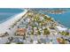 Aerial view of beach houses and the ocean at 1205 Gulf Way, St Pete Beach, FL 33706