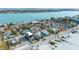 Aerial view of beach houses and the ocean at 1205 Gulf Way, St Pete Beach, FL 33706