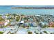 Aerial view of beach houses and the ocean at 1205 Gulf Way, St Pete Beach, FL 33706