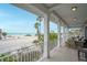 Covered balcony overlooking the beach at 1205 Gulf Way, St Pete Beach, FL 33706