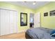 Bedroom with large closet and adjacent sitting area at 1205 Gulf Way, St Pete Beach, FL 33706