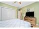 Spacious bedroom with a queen-size bed and ample closet space at 1205 Gulf Way, St Pete Beach, FL 33706