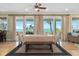 Ocean-view dining area with table and bench at 1205 Gulf Way, St Pete Beach, FL 33706