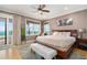 Spacious main bedroom with a king-size bed and ocean views at 1205 Gulf Way, St Pete Beach, FL 33706