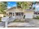 Charming bungalow with screened porch and detached garage at 1304 E 32Nd Ave, Tampa, FL 33603