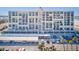 Aerial view of building, parking and beach access at 1400 Gulf Blvd # 308, Clearwater, FL 33767