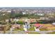 Aerial view of house and neighborhood by the canal at 141 Singapore Rd, Punta Gorda, FL 33950